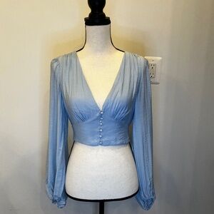 Light blue lantern sleeve button-up croptop